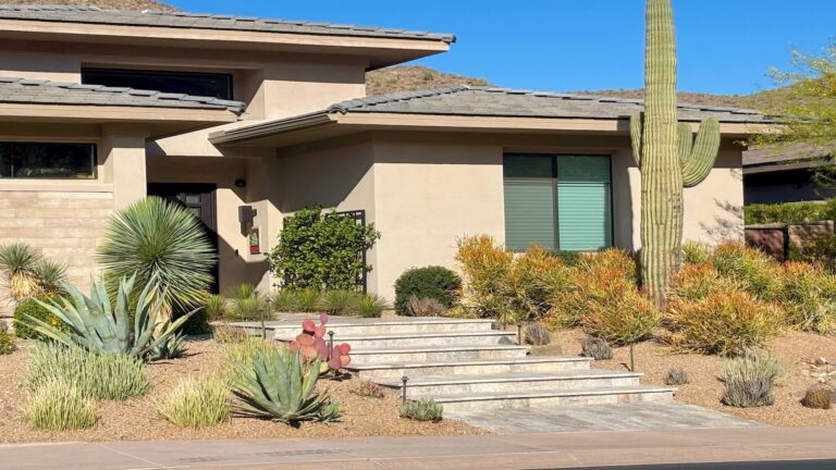 Arizona home with desert landscaping and stepped entry illustrating HELOC equity requirements and CLTV qualification