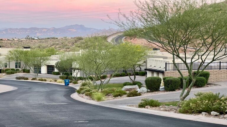 Arizona neighborhood street at sunset showing homes where homeowners consider using home equity to pay medical bills