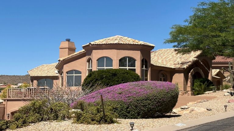 Homeowner reviewing home equity investment pros and cons including no monthly payment benefit and appreciation sharing cost