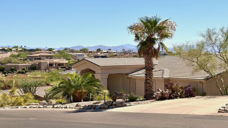 Arizona desert home with palm trees and mountain views — HEI planning article